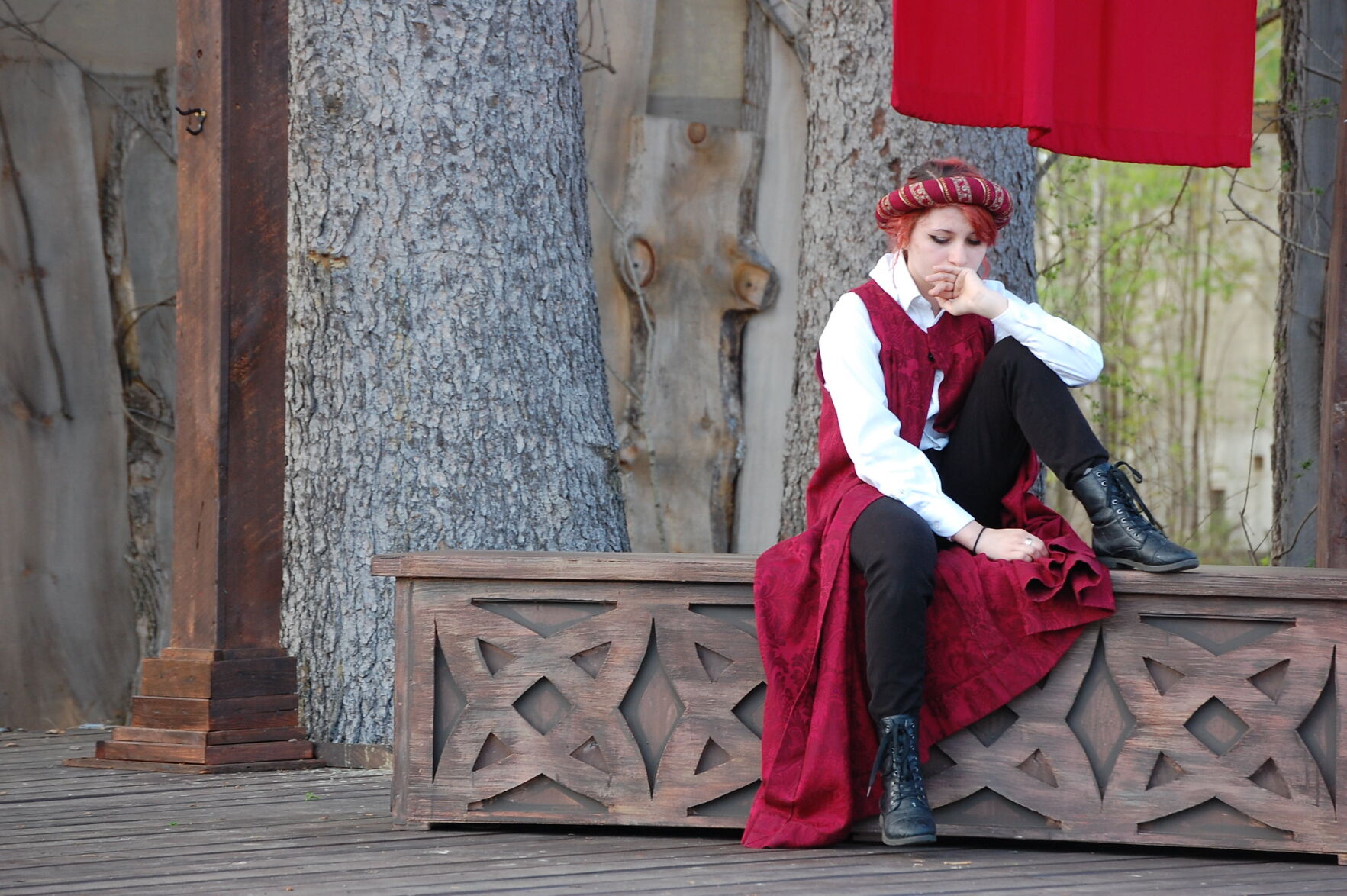 Girl sits on bench